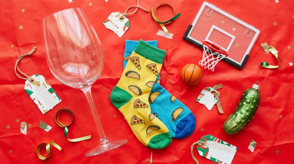 White elephant gift ideas under $25: giant wine glass, novelty socks and desk game